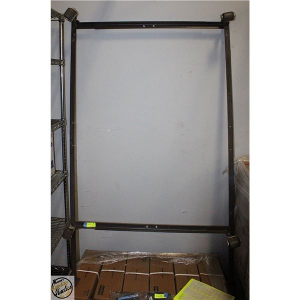 TWIN BEDFRAME METAL ON CASTORS