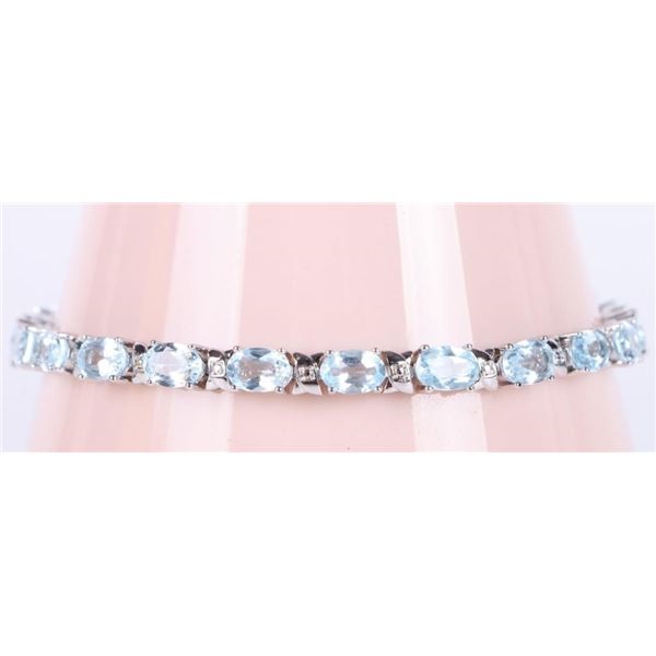 6.6CTW BRIGHT BLUE TOPAZ STERLING SILVER BRACELET