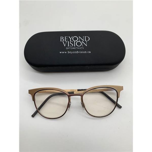 Gold and Black Rimmed Glasses with Case by Beyond Vision