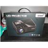 Image 2 : LED projector features TFT LCD imaging technology with an LED light source.