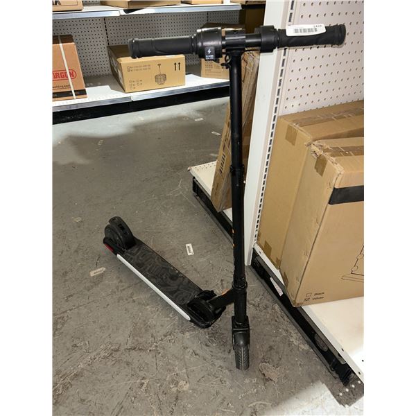 Electric Scooter With Handlebar Controls and Foldable Design