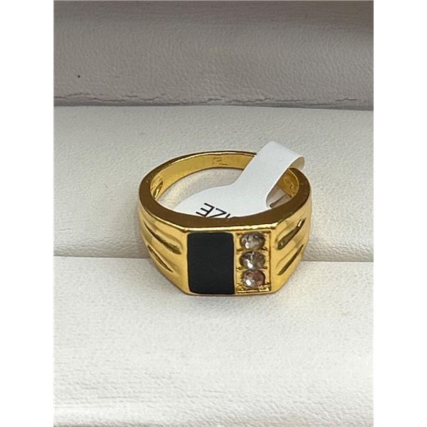 Gold-Tone Ring Featuring Black Panel and Three Clear Stones