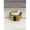 Image 1 : Gold-Tone Ring Featuring Black Panel and Three Clear Stones