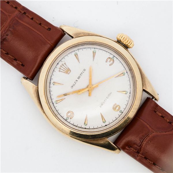 Gold Rolex Oyster Precision 33 mm watch