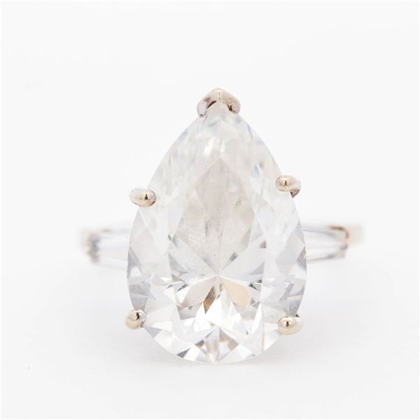 4.9 gram 14KWG Solitaire Ring with Pear Cut Colorless Stone