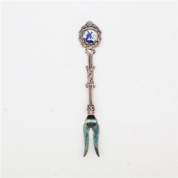 Vintage silver tone collector's fork with windmill design