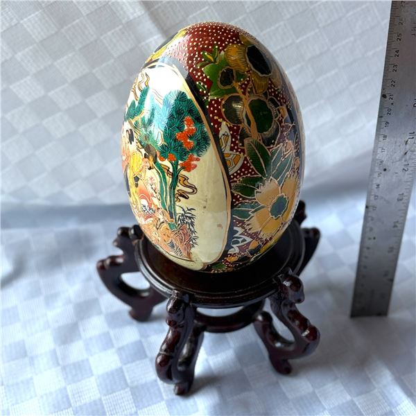 LARGE PORCELAIN PAINTED EGG WITH STAND