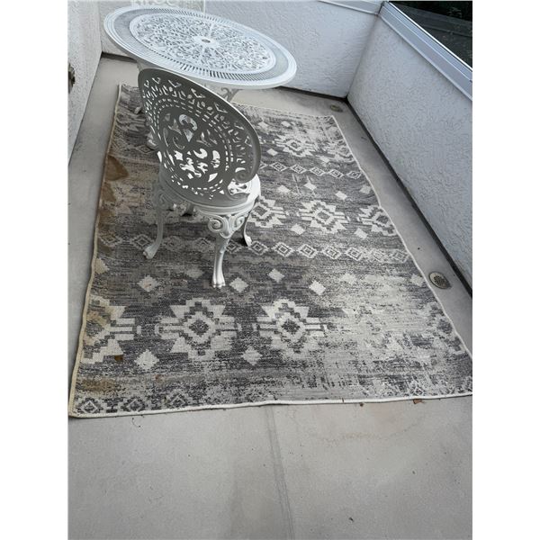 Area carpet some water