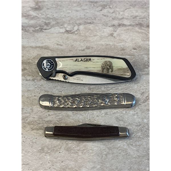 Lot of 3 Folding Knifes. One Blade Broken On Silver One.