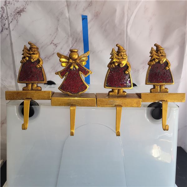 Lot of 4 Heavy Stocking Holders, 1 Angel, 3 Santa Claus.