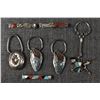 Image 1 : FOUR NATIVE AMERICAN KEYCHAINS AND THREE MONEY CLIPS