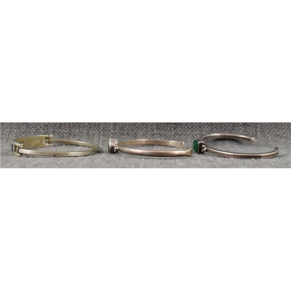 THREE SILVER AND STONE BRACELETS