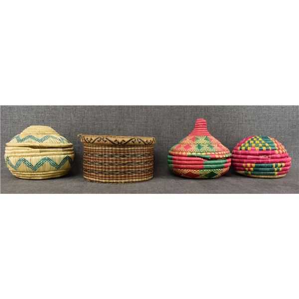 FOUR DECORATIVE BASKETS
