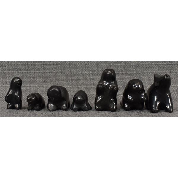 SEVEN SANTA CLARA POTTERY FIGURES
