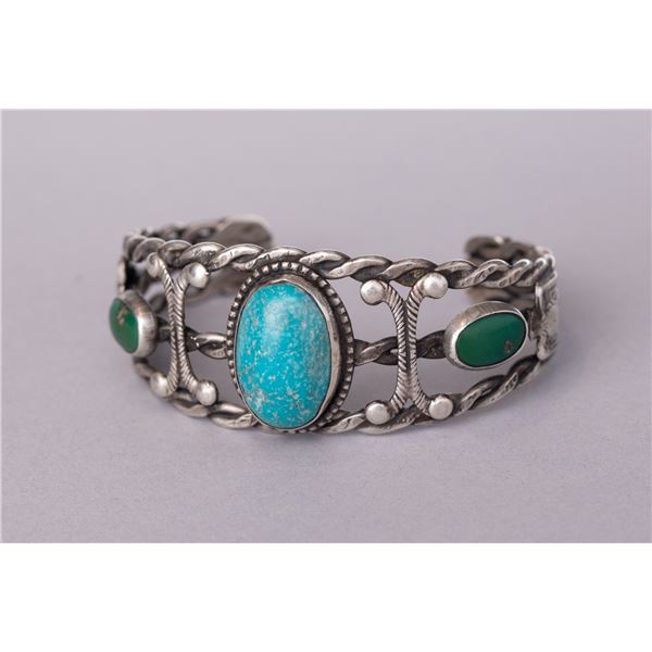 Fred Harvey Era Cuff Bracelet with Three Turquoise Stones, Braided Silver, and Thunderbirds