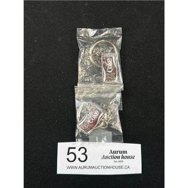 2 NOS 1960s Coca-Cola Can Keychains
