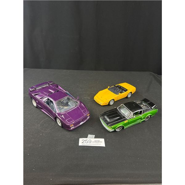 Lot of 3 Diecast Cars, 1/18th and 2 1/24th Scale