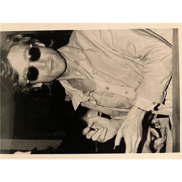 John Lennon unsigned photo