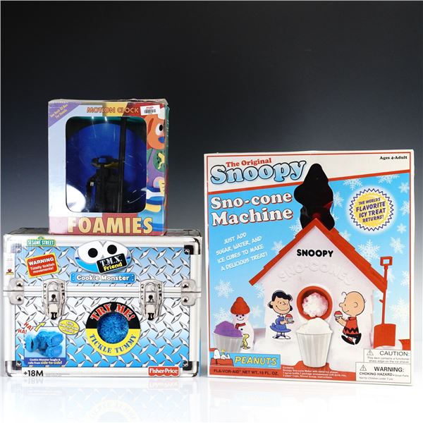 3pc Toys Snoopy Sno-Cone Machine, TMX Cookie Monster Foamies, Motion Clock