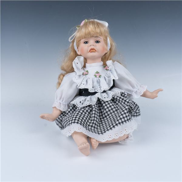 Crying Porcelain Sitting Doll