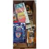 Image 2 : BOX OF NEW CAP LIGHTS, PSTOL STORAGE AMMO CLOAKS AND MORE