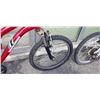 Image 11 : GREEN NORCO AND RED REVOLUTION BIKES