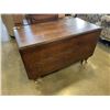 Image 1 : ANTIQUE DROP LEAF DINING TABLE ON CASTERS