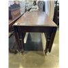 Image 2 : ANTIQUE DROP LEAF DINING TABLE ON CASTERS
