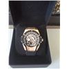 Image 8 : NEW Q. HUBLOT SKELETON FACE REPLICA WATCH. ROSE GOLD CASE. MULTI-COLOR DIAL. BLUE RUBBER FLEX STRAP.