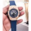 Image 9 : NEW Q. HUBLOT SKELETON FACE REPLICA WATCH. ROSE GOLD CASE. MULTI-COLOR DIAL. BLUE RUBBER FLEX STRAP.