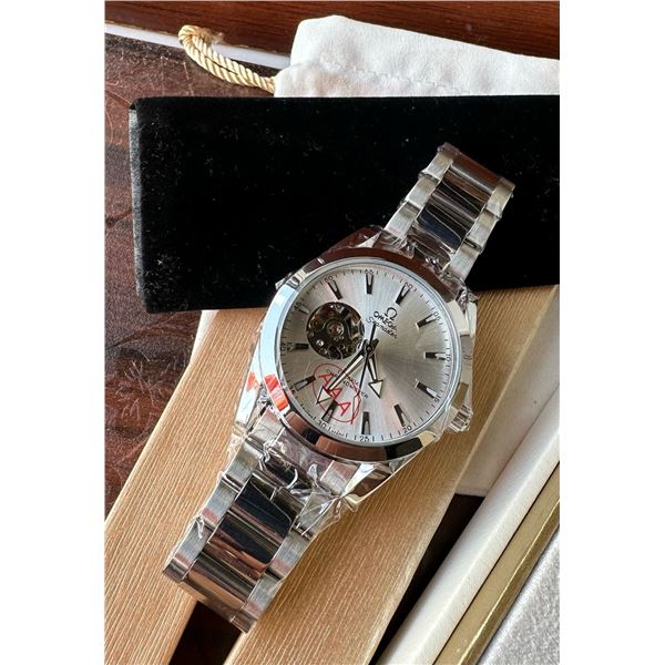 NEW AUTOMATIC OMEGA SPEEDMASTER CHRONOMETER WITH SIDE TOURBILLON (OPEN WORKS). SILER DIAL. STAINLESS