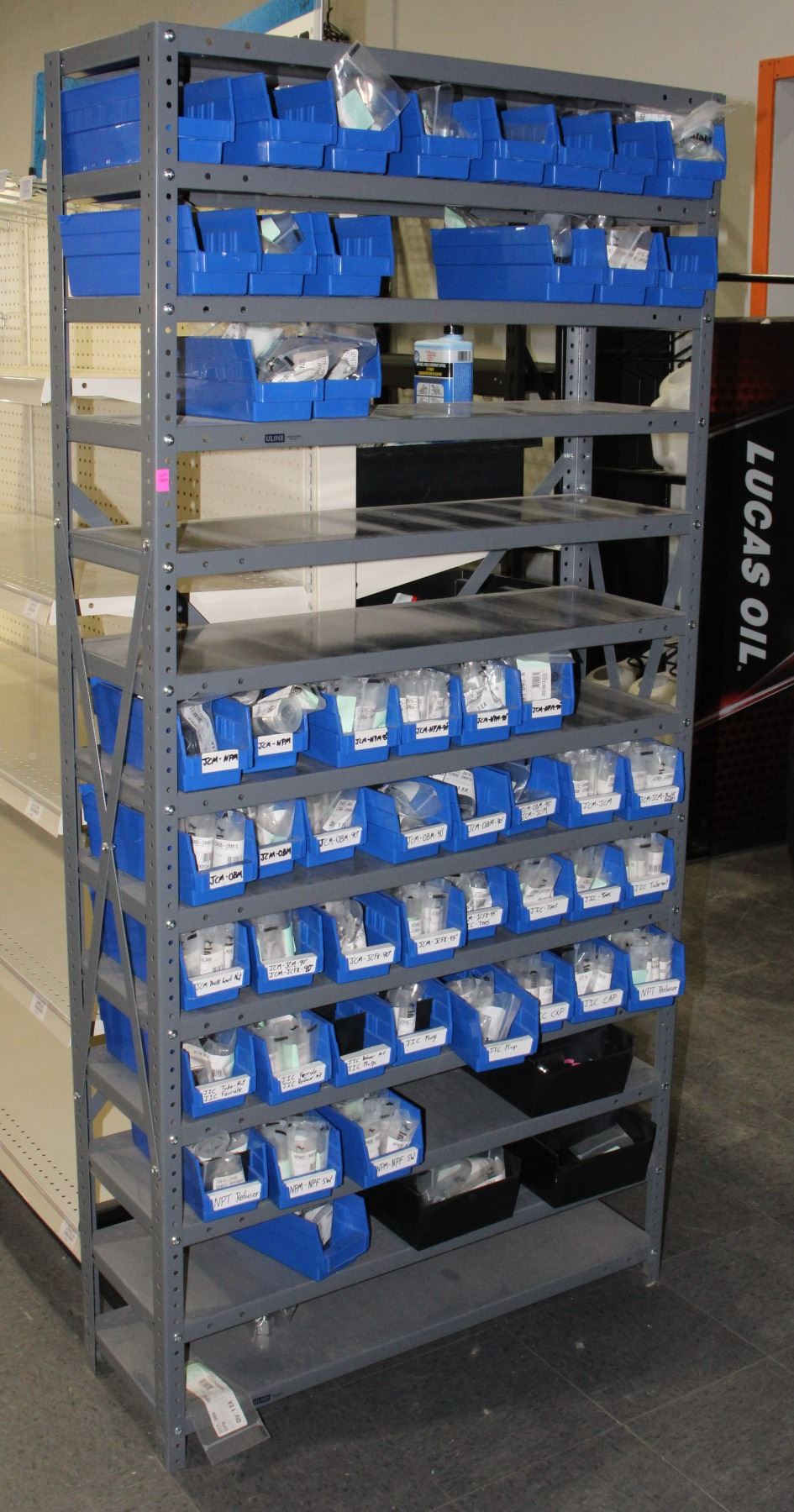 GREY METAL ULINE ADJUSTABLE SHELVING UNIT