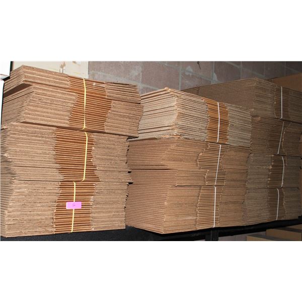THREE STACKS OF SHIPPING BOXES