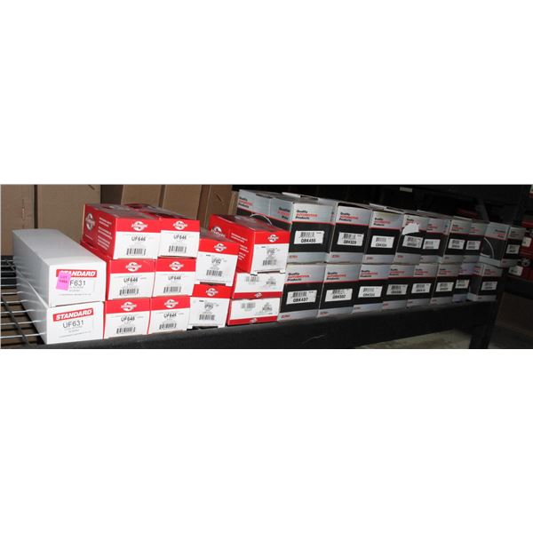 SHELF OF AUTOMOTIVE PARTS INCLUDING BOOTS