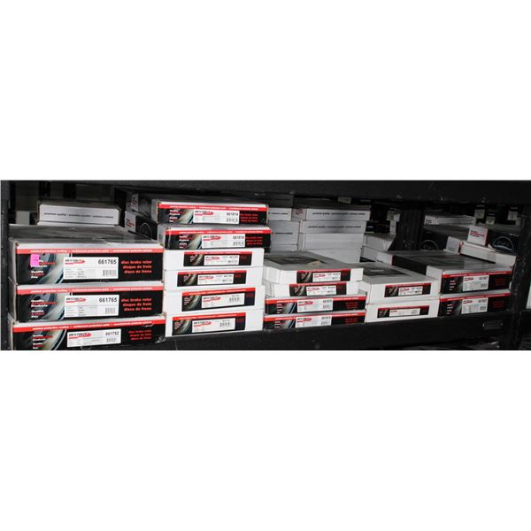 SHELF OF ASSORTED BRAKE ROTORS