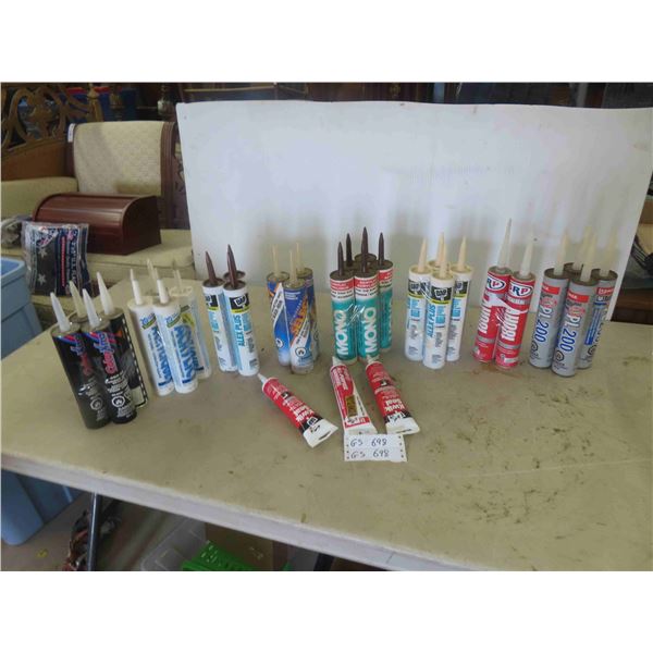32 Tubes of Caulking & Kwik Seal 