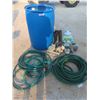 Image 1 : 45 Gallon Poly Barrel with 2 Garden Hoses & 7 Garden Ornaments