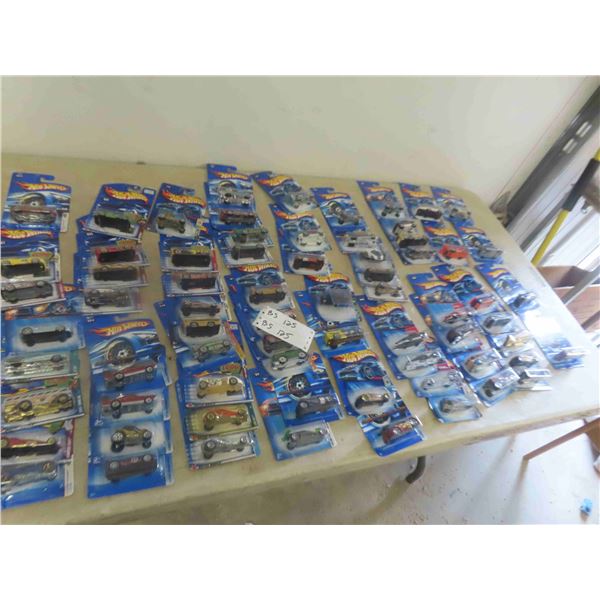 70 Hot Wheels in Packages, Early 2000s. 