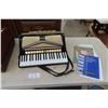 Image 1 : Camillo Accordian with Music Books 