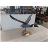 Image 1 : Wood Carved Canada Goose in Flight 23'' H x 22'' Long x 28'' Wing Span 