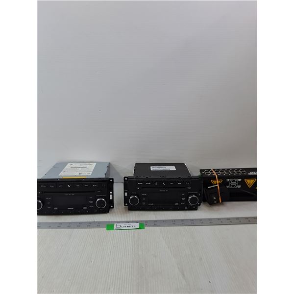 (2) Chrysler Car Stereos & Ethernet Switch- As Is