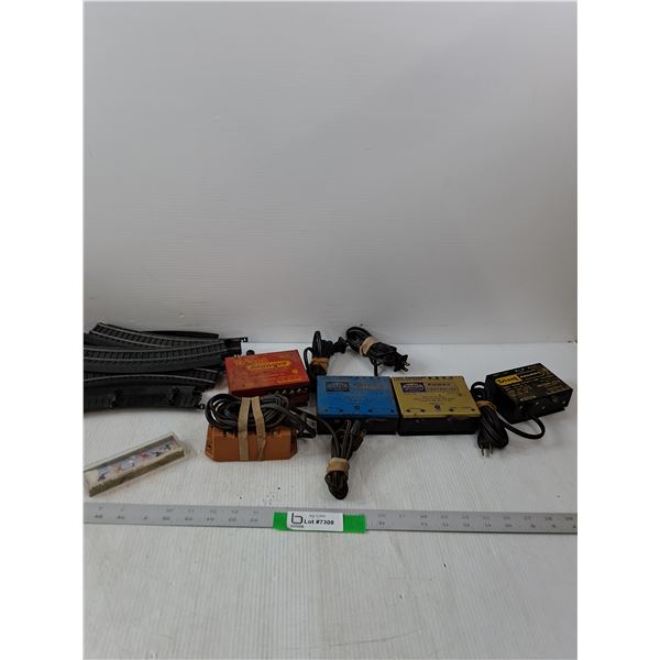 (5) Hobby Transformer, Toy Train Tracks & Figure Skating Figures- As Is