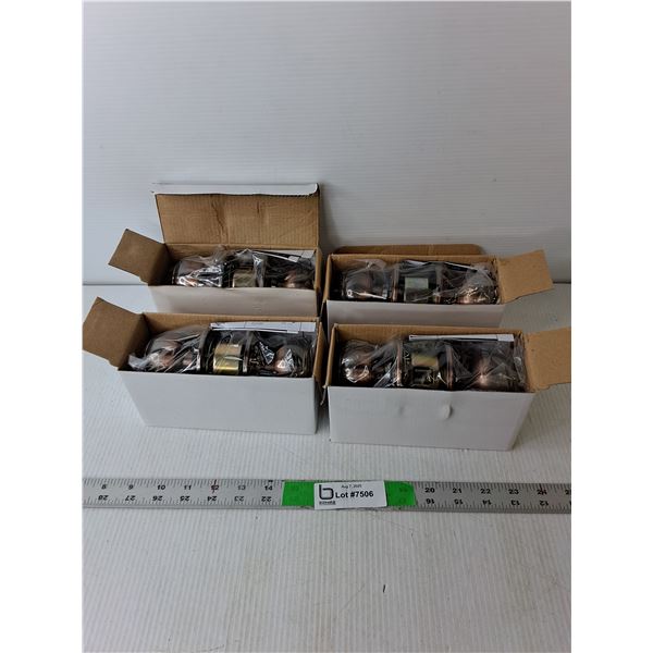 (4) Doorknob Installation Kits- NIB, Some Water Damage