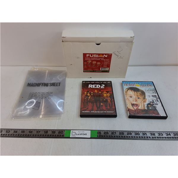 (3) Flameless Christmas Candles, Home Alone DVD, Red 2 DVD, (2) Magnifying Sheets