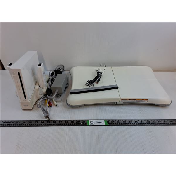 Wii Console, (2) Controllers, Charging Dock, Wii Fit Pad, Power Cords For Wii Console, Wii Sensor Ba