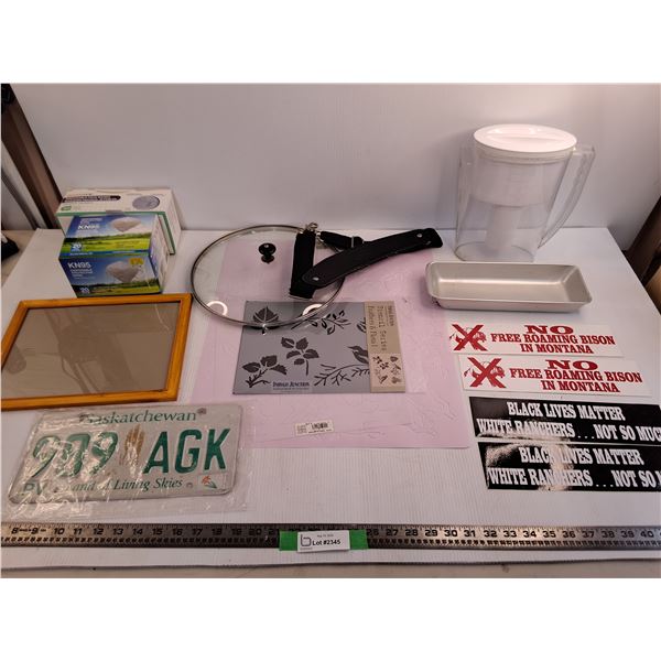 (2) Partial Boxes of Face Masks, Saskatchewan License Plate, Flower Stencils, Misc