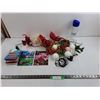 Image 1 : InTouch 2025 Magazines, 10″ EDP Water Bottle, Apple Lightning Charger, Plastic Flower Decor