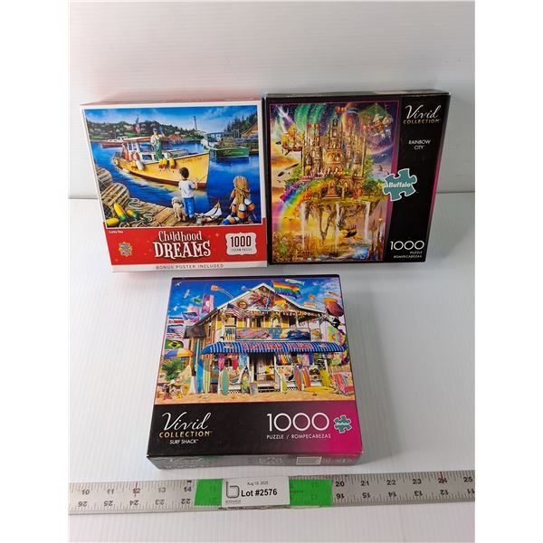 (3) 1000 Piece Puzzles- 'Lucky Day, Rainbow City- Sealed, Surf Shack'  - COMPLETE