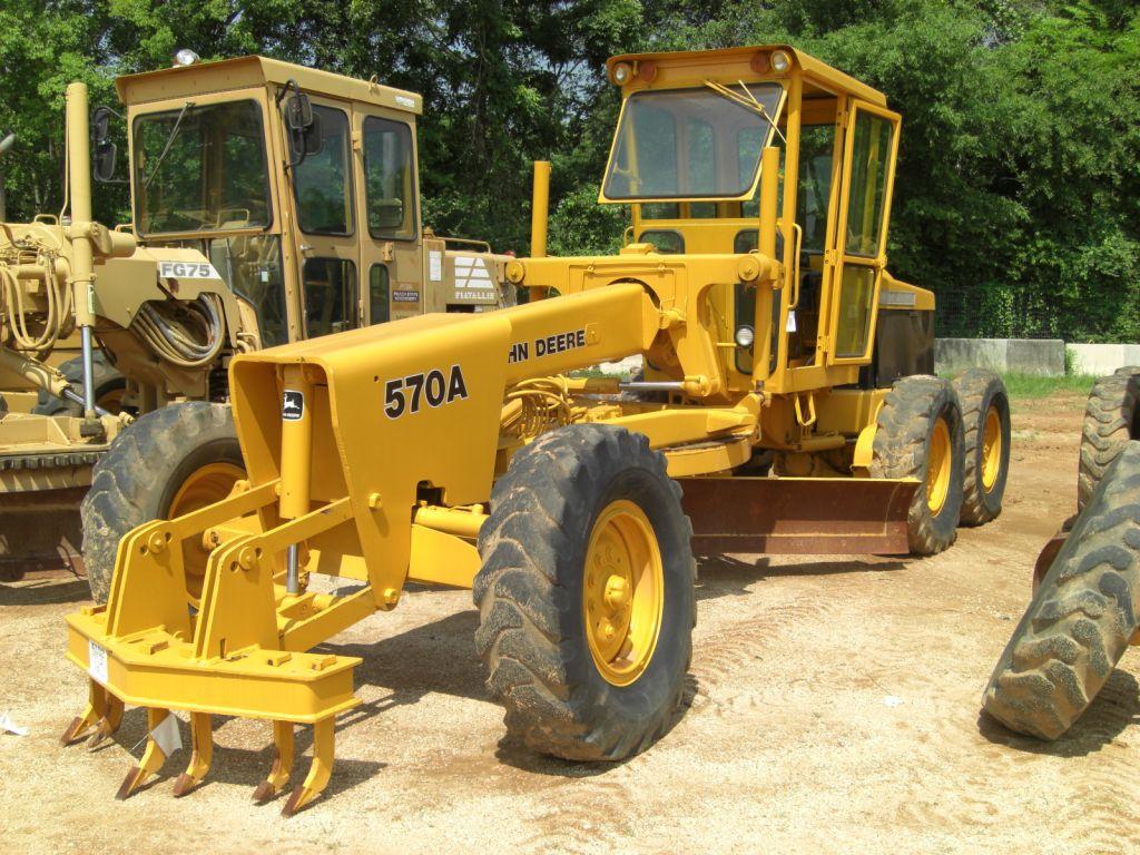 JOHN DEERE 570A MOTOR GRADER J.M. Wood Auction Company, Inc.