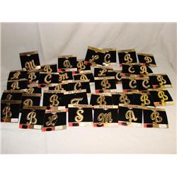 40 Revlon Initial Brooches
